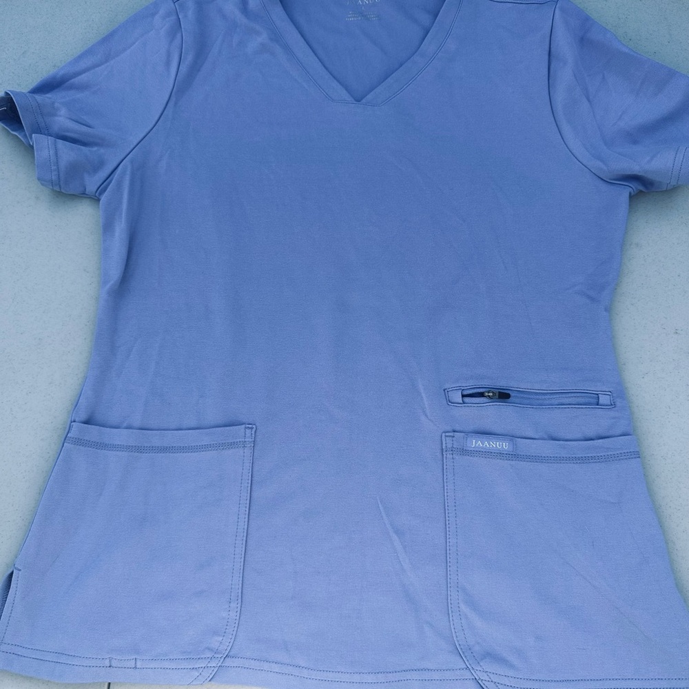 Jaanuu Women's Blue V-Neck Top